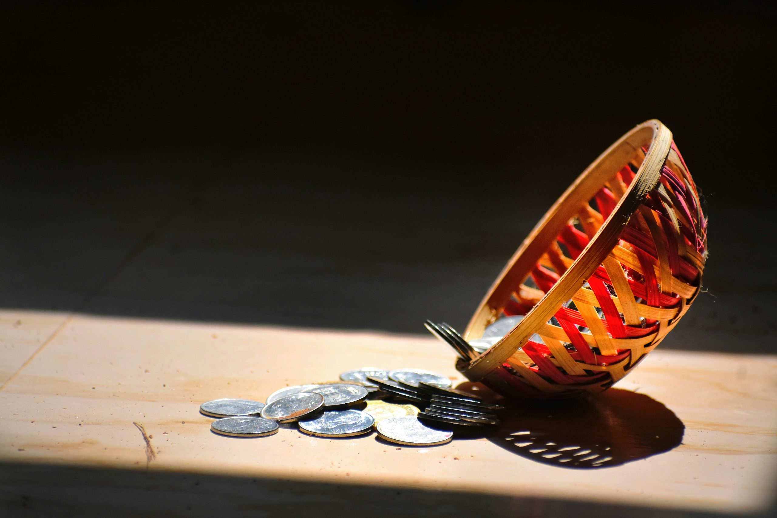 a bowl full of change in the sun