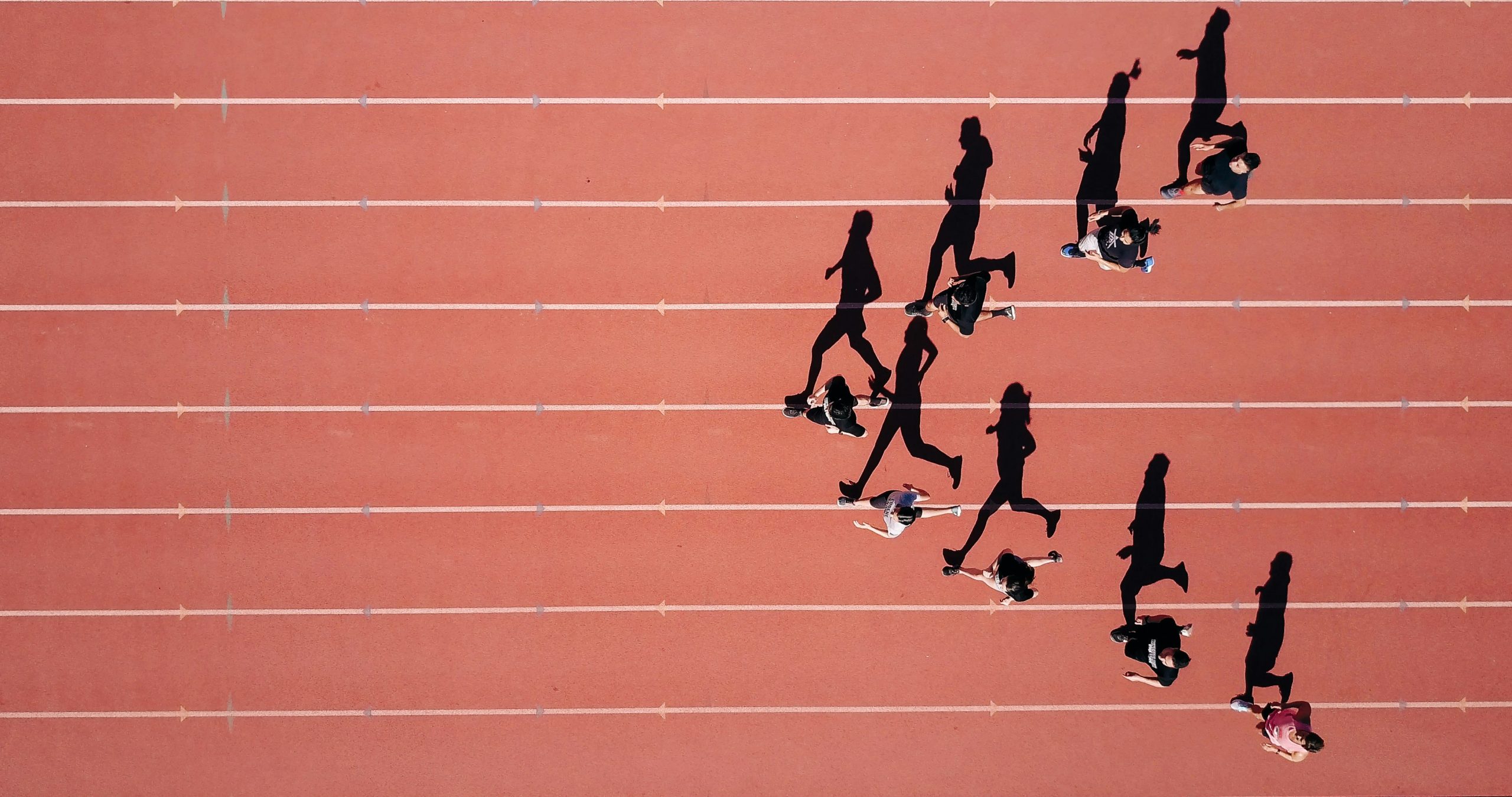 athletes running to a finishing line
