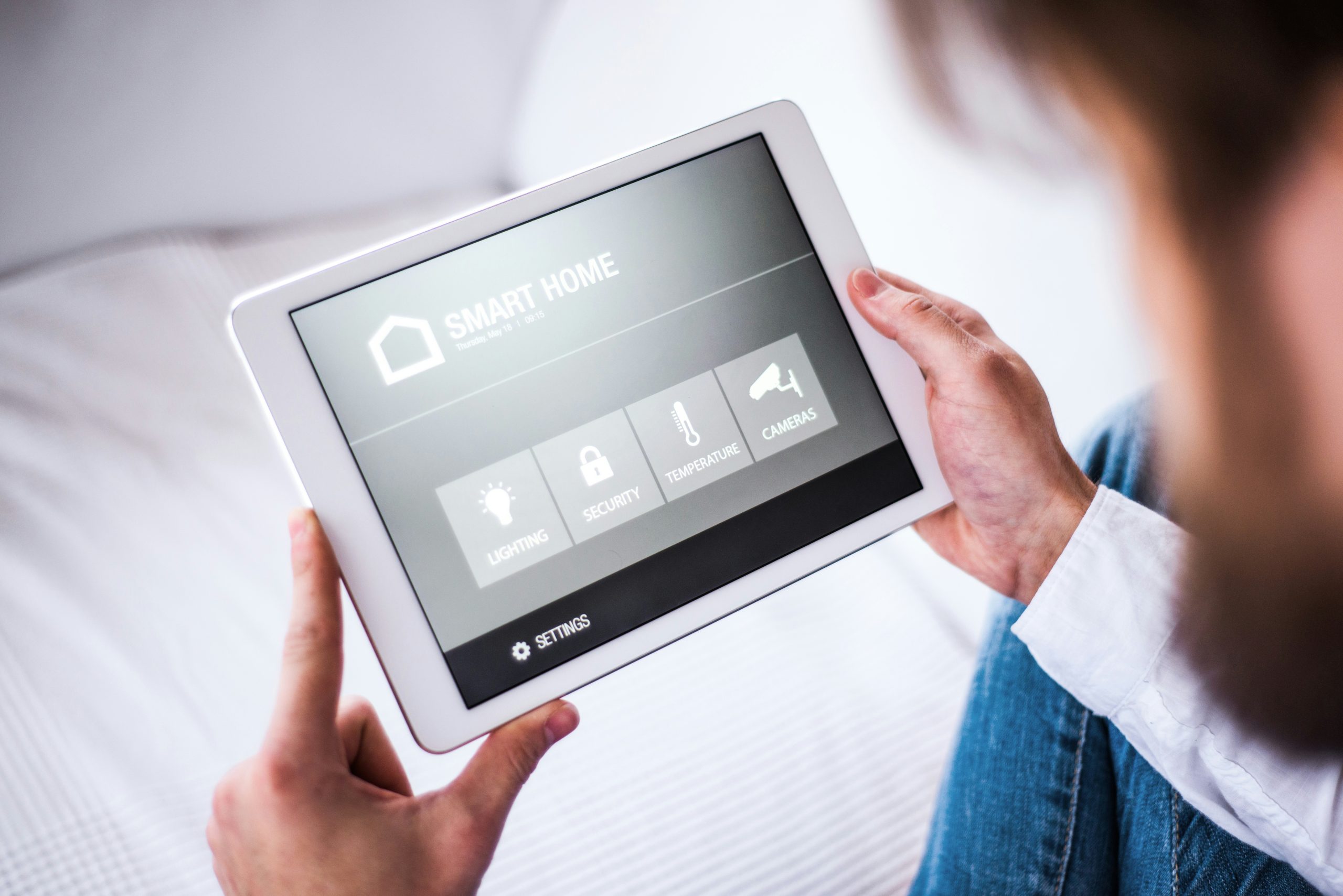 a man using their smart heating home app